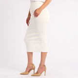 WHITE SKIRT WITH SLIT AT THE BACK
