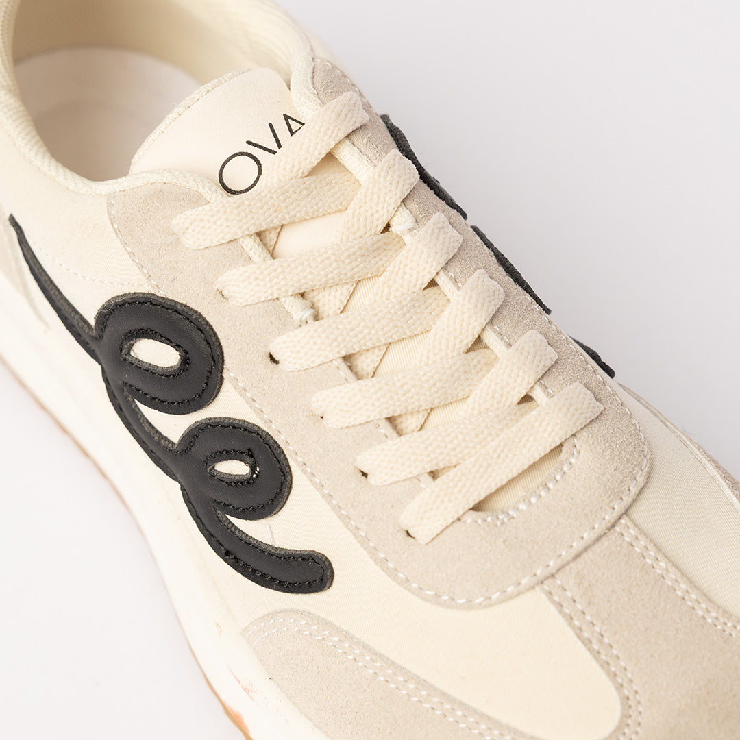 Sneaker.Black Applique Detail.