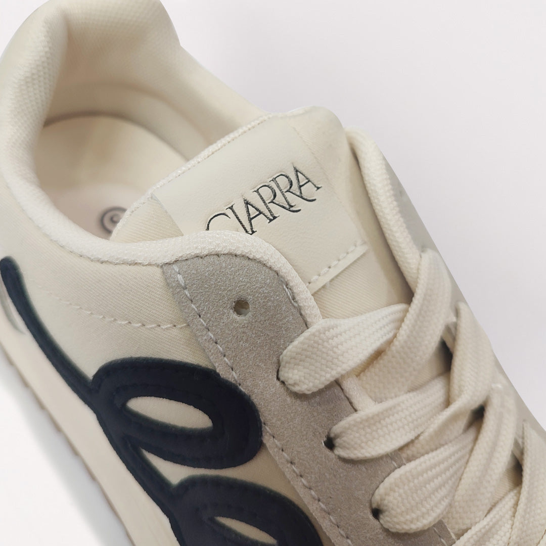 Sneaker.Black Applique Detail.