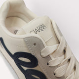 Sneaker.Black Applique Detail.