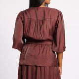 SHIMMER PEPLUM BLOUSE