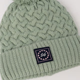 Cable Knite Turn Up Beanie.Pom Pom.
